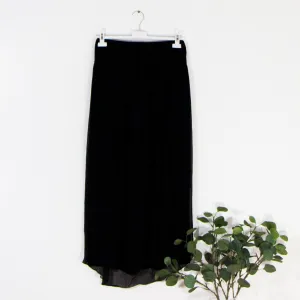 Free flowing silk trousers with comfortable under layer and trouser cape
